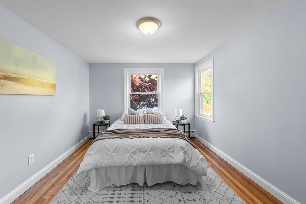 22 Leonard Road Sharon, MA 02067 - Photo 15 of 41 a bedroom with a bed and window