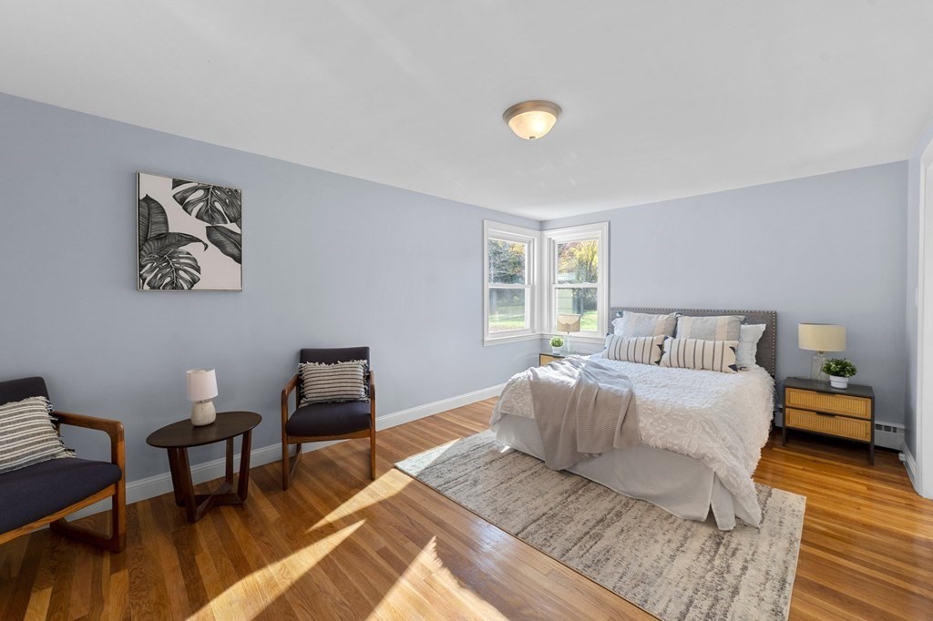 22 Leonard Road Sharon, MA 02067 - Photo 21 of 41 a bedroom with a bed and a desk