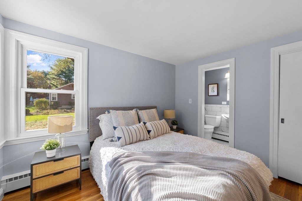 22 Leonard Road Sharon, MA 02067 - Photo 23 of 41 a bedroom with a bed and window