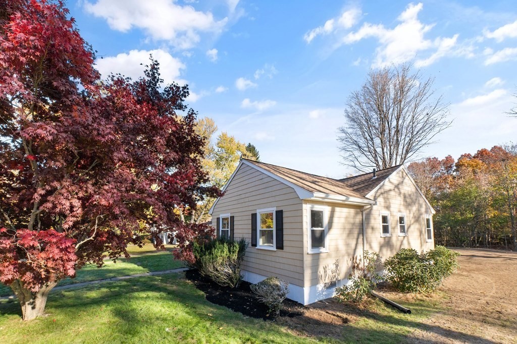 22 Leonard Road Sharon, MA 02067 - Photo 39 of 41 a front view of a house with garden