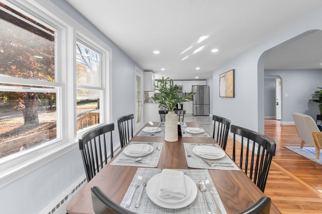 22 Leonard Road Sharon, MA 02067 - Photo 9 of 41 a view of a dining room with furniture window and wooden floor