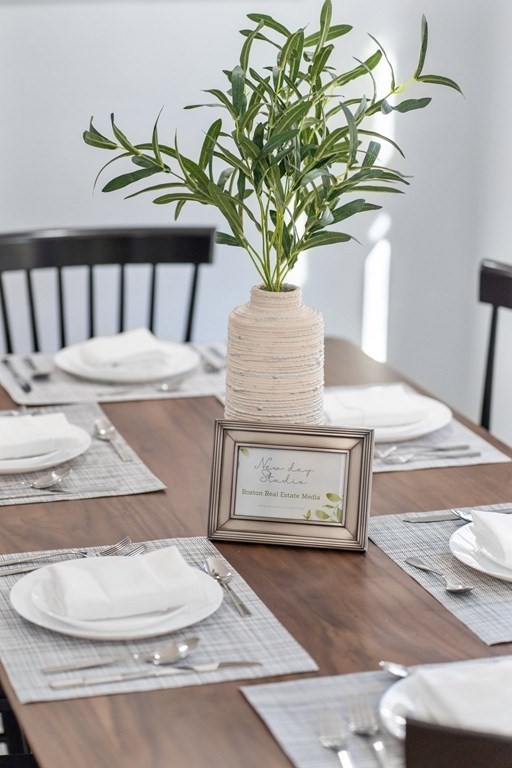 22 Leonard Road Sharon, MA 02067 - Photo 10 of 41 a vase of flowers sitting on a table