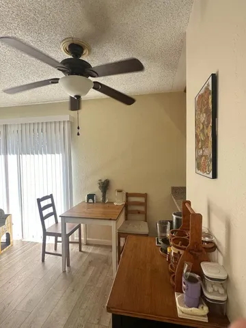 a room with furniture and a wooden floor