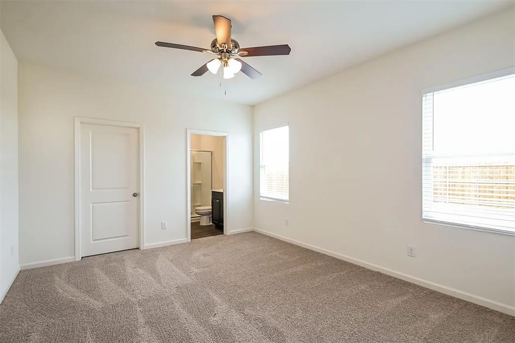 6214 Old Bridge Way Forney, TX 75126 - Photo 5 of 15 a view of an empty room with a window