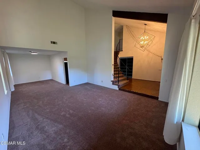 a view of empty room with front door