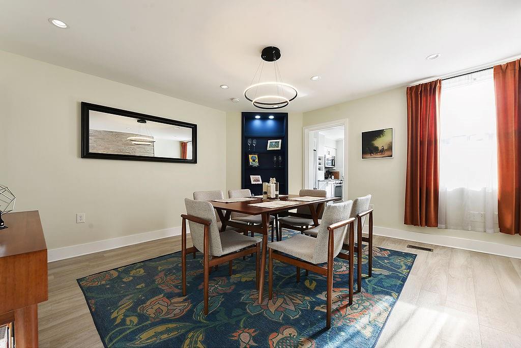 6906 Standish Street Pittsburgh, PA 15206 - Photo 11 of 31 a view of a dining room with furniture and wooden floor