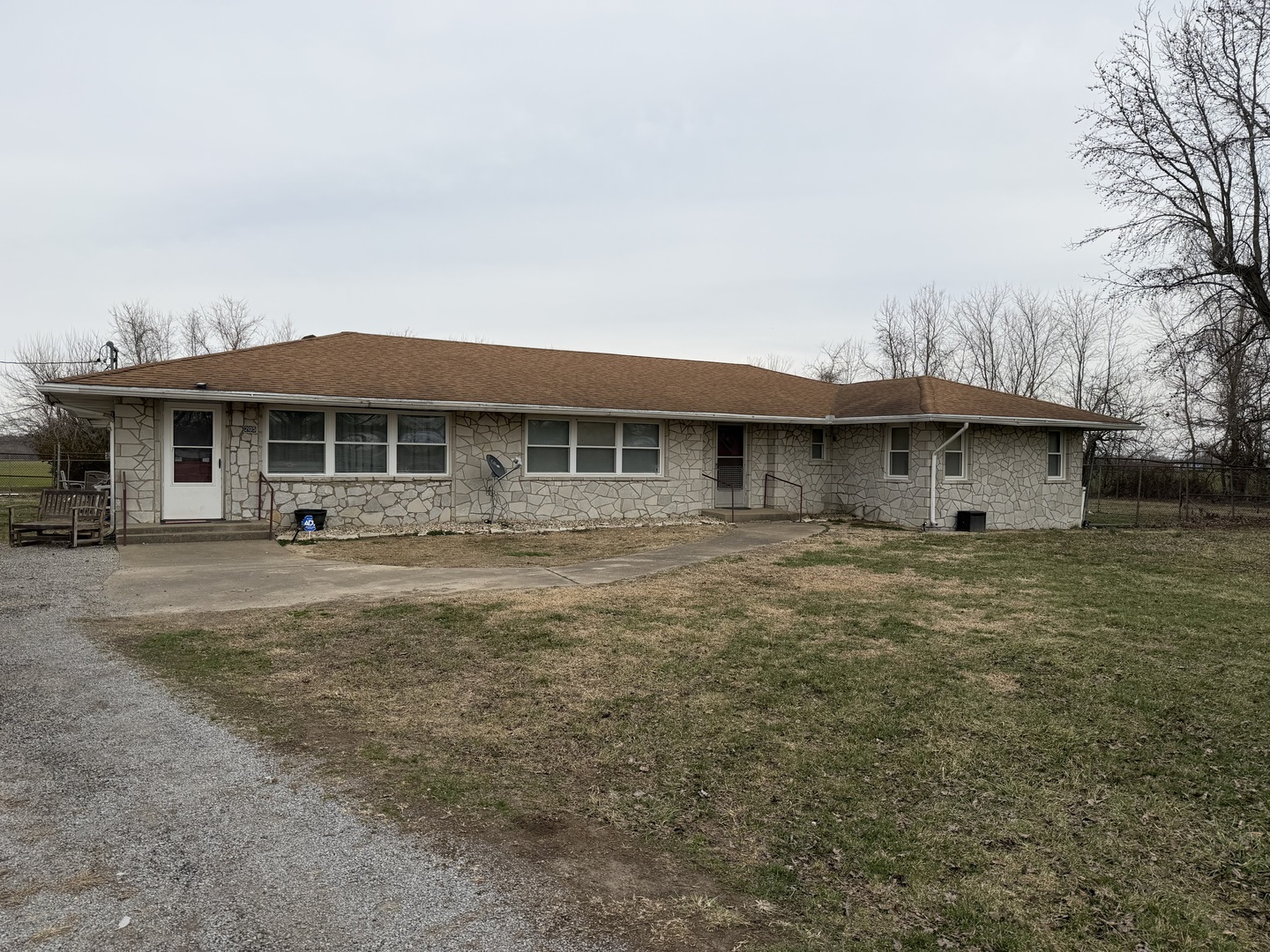 205 Kimmel Bridge Road Murphysboro, IL 62966 - Photo 1 of 33 a front view of a house with a garden