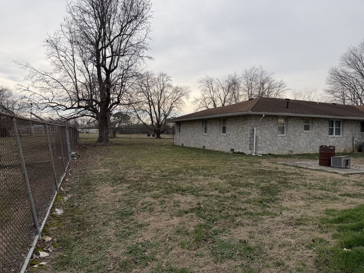 205 Kimmel Bridge Road Murphysboro, IL 62966 - Photo 24 of 33 a view of a backyard with large trees