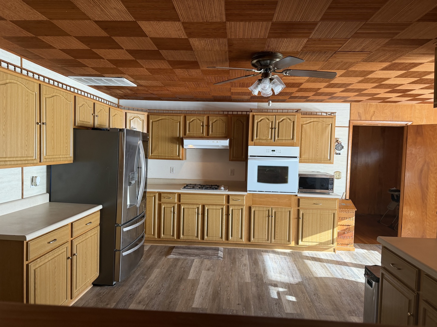205 Kimmel Bridge Road Murphysboro, IL 62966 - Photo 6 of 33 a kitchen with stainless steel appliances granite countertop a refrigerator a oven a stove with wooden cabinets