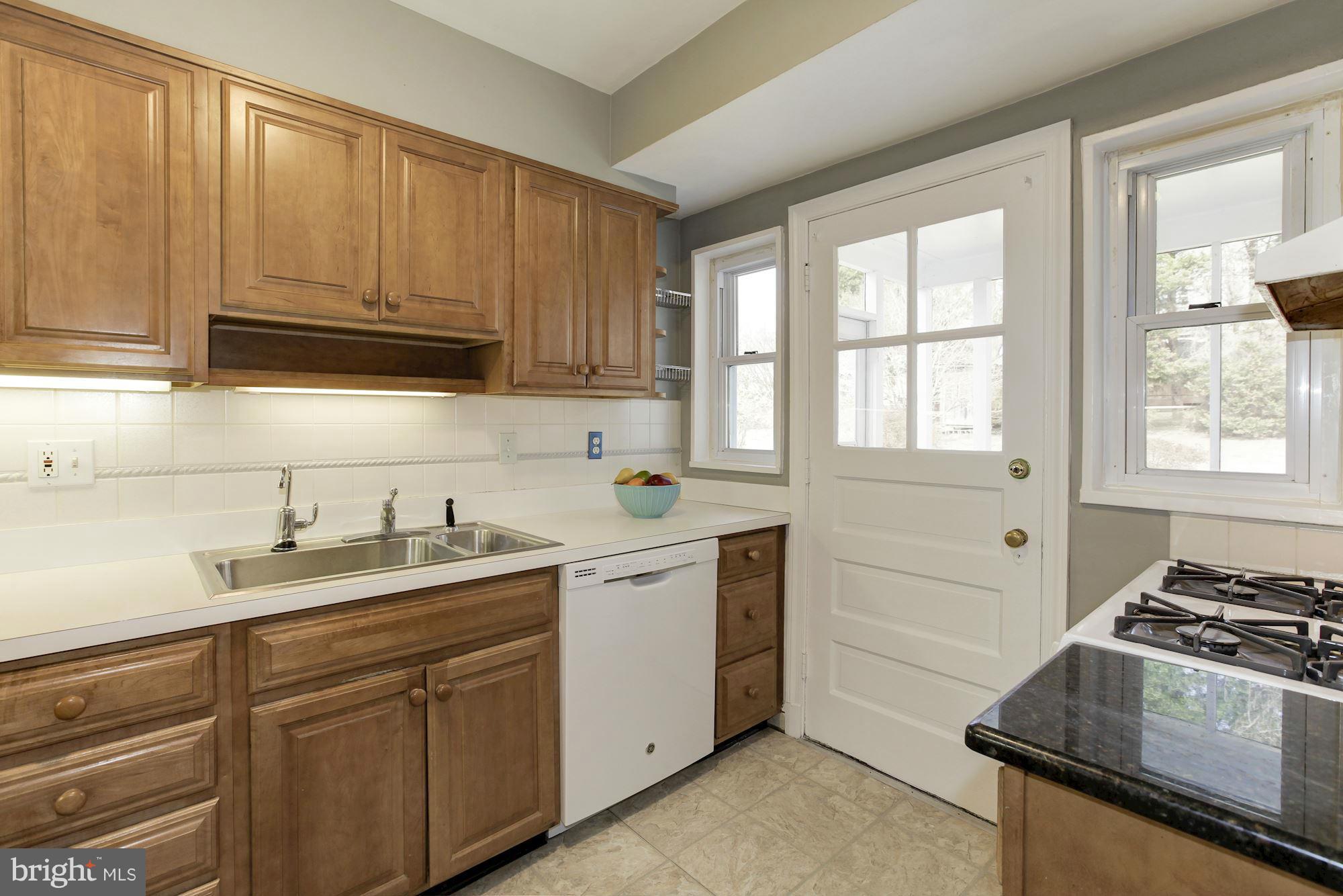 1705 Brisbane Street Silver Spring, MD 20902 - Photo 8 of 27 Kitchen w/ access to screened in porch