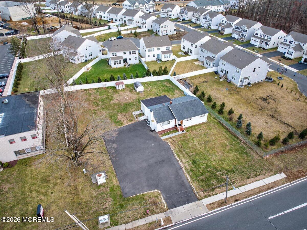 17 North Main Street Marlboro, NJ 07746 - Photo 13 of 67 an aerial view of residential houses with outdoor space
