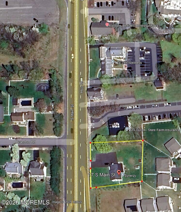 17 North Main Street Marlboro, NJ 07746 - Photo 14 of 67 an aerial view of a house with a garden and lake view