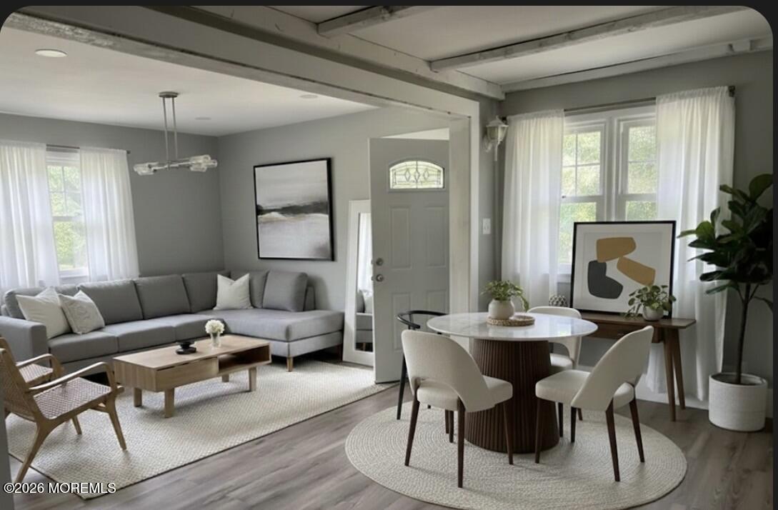 17 North Main Street Marlboro, NJ 07746 - Photo 21 of 67 a living room with furniture a fireplace and a potted plant