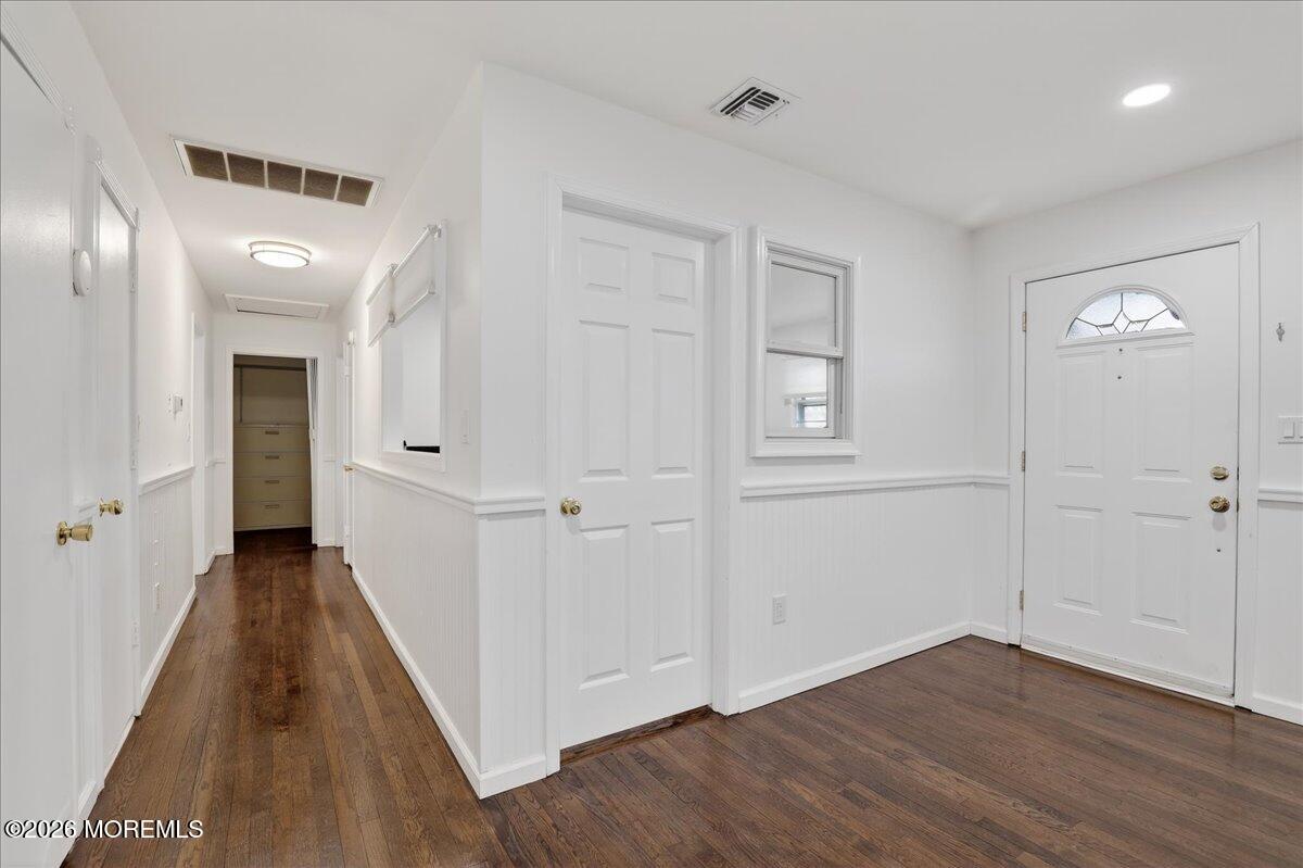 17 North Main Street Marlboro, NJ 07746 - Photo 29 of 67 a view of a hallway with wooden floor