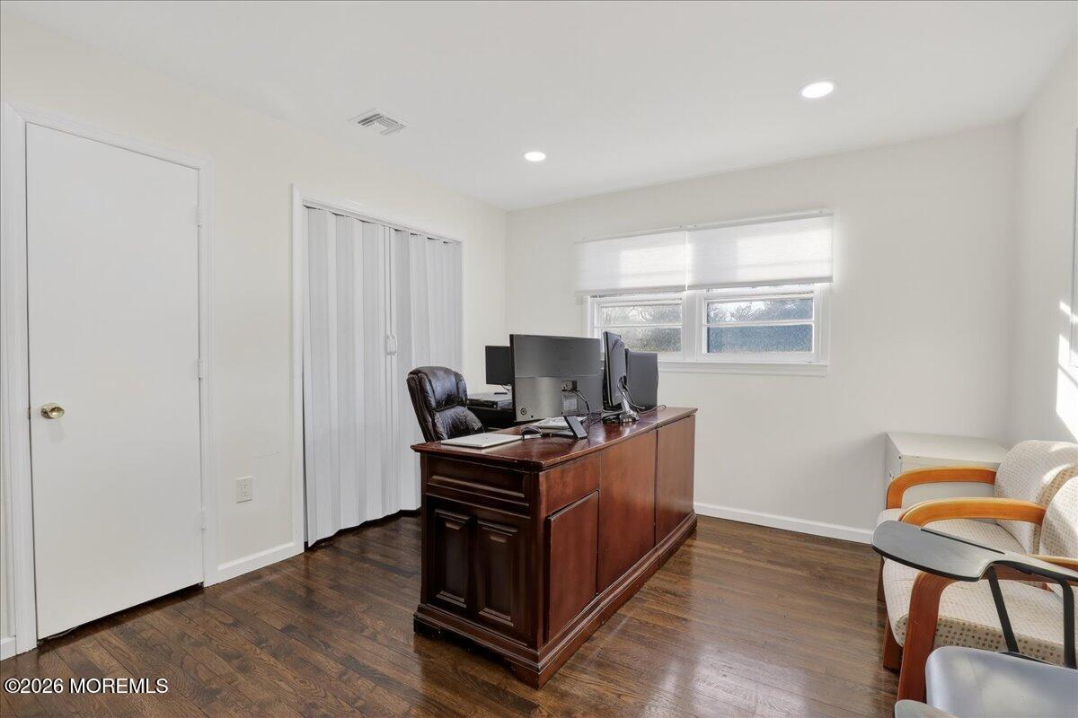 17 North Main Street Marlboro, NJ 07746 - Photo 38 of 67 a view of a workspace with furniture and a window