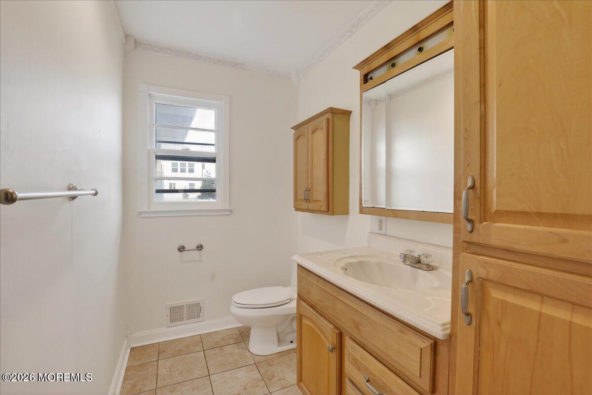 17 North Main Street Marlboro, NJ 07746 - Photo 41 of 67 a bathroom with a sink toilet and shower