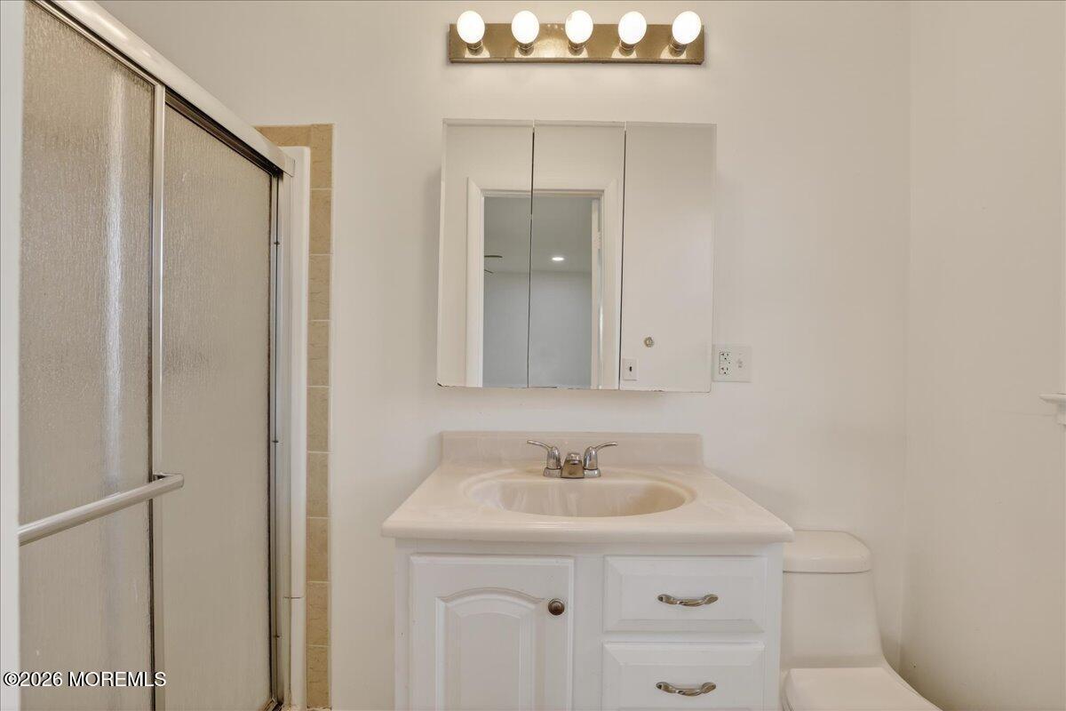 17 North Main Street Marlboro, NJ 07746 - Photo 45 of 67 a bathroom with a sink and a mirror