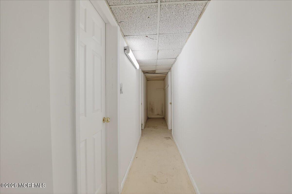 17 North Main Street Marlboro, NJ 07746 - Photo 49 of 67 a view of a hallway with a white walls