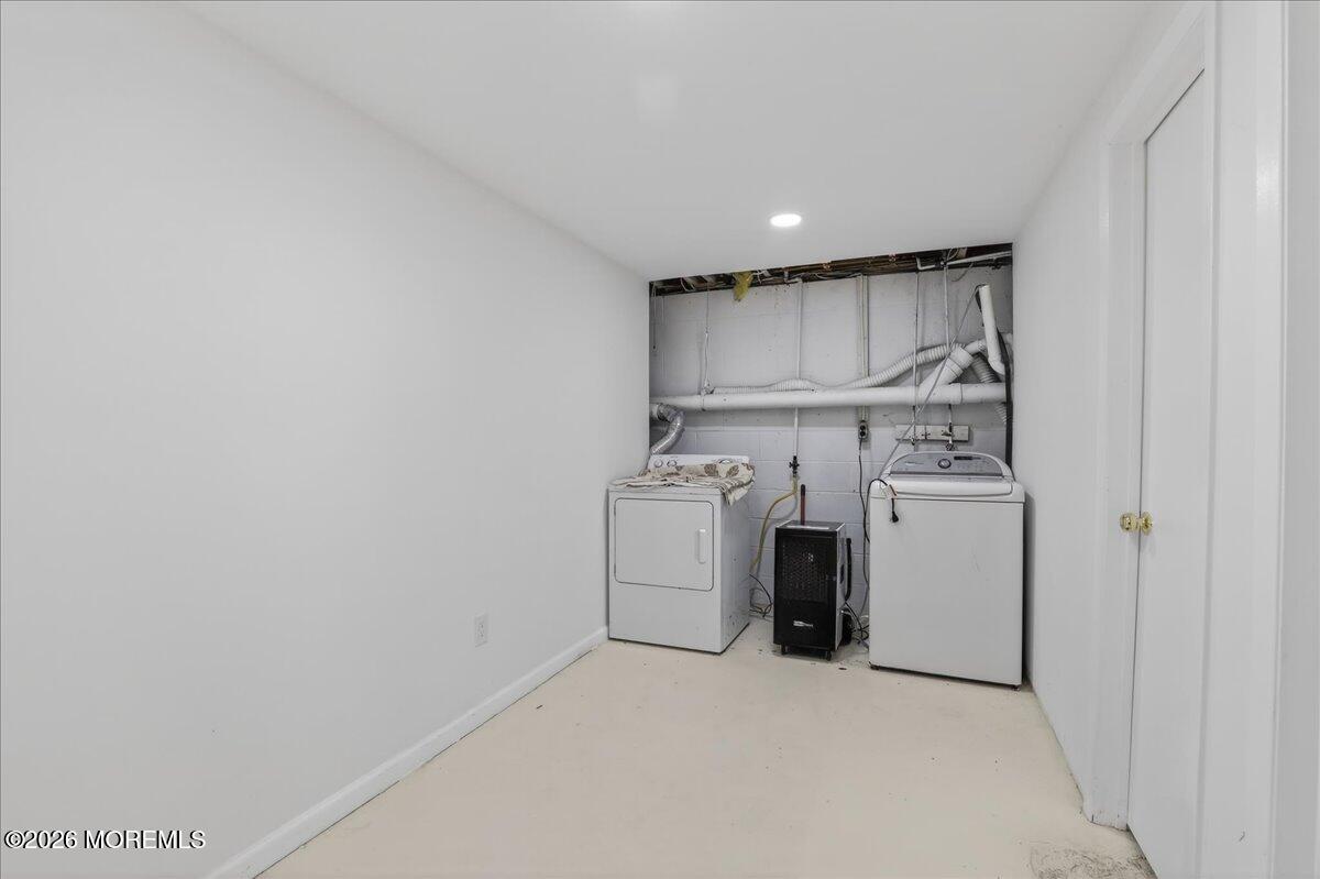 17 North Main Street Marlboro, NJ 07746 - Photo 51 of 67 a utility room with dryer and washer