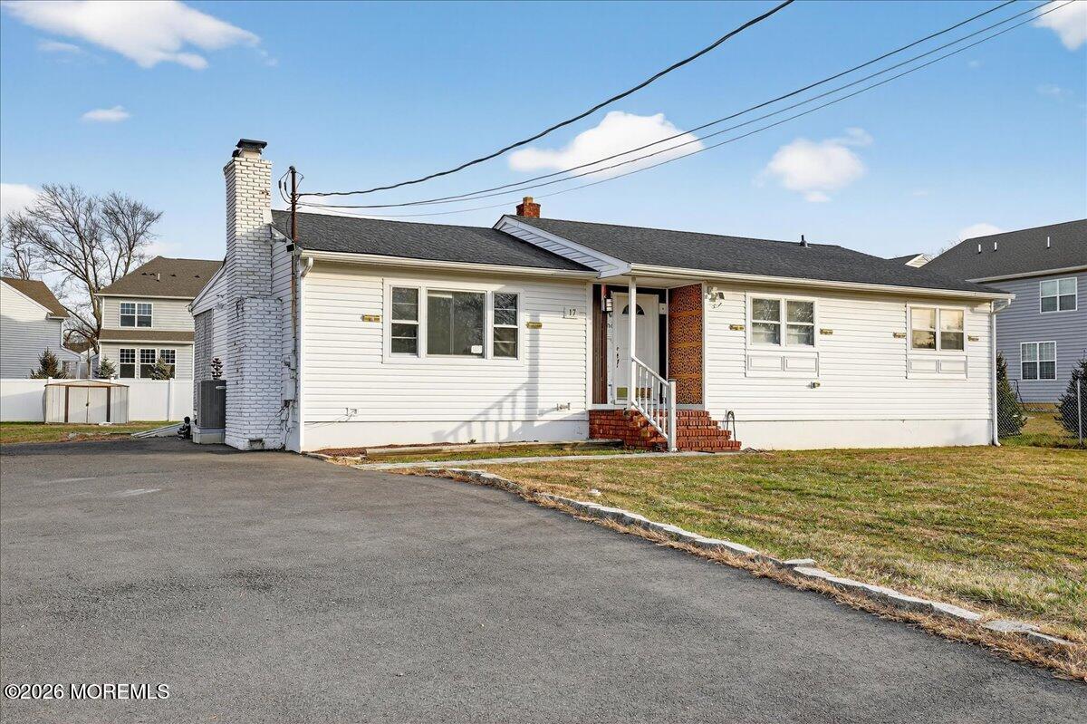 17 North Main Street Marlboro, NJ 07746 - Photo 54 of 67 a view of a house with a backyard and a window