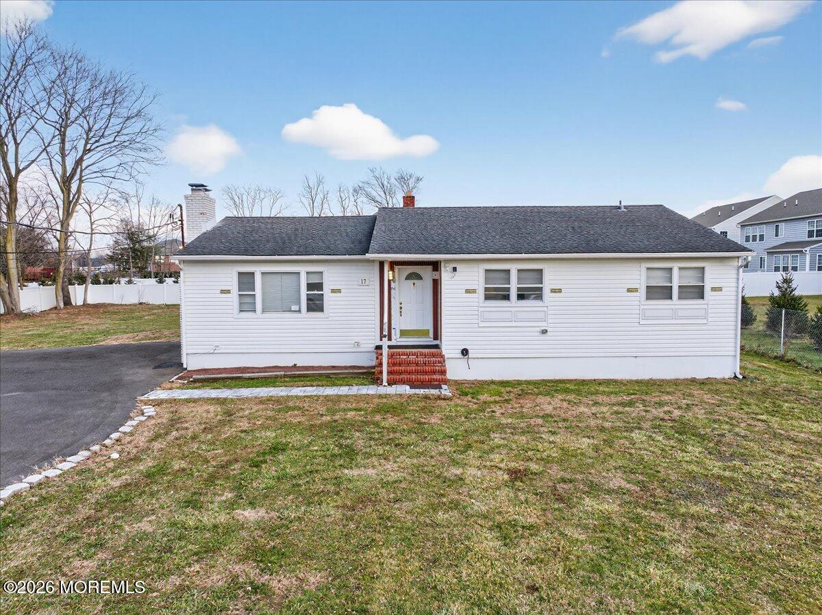 17 North Main Street Marlboro, NJ 07746 - Photo 55 of 67 a house that has a tree in front of it
