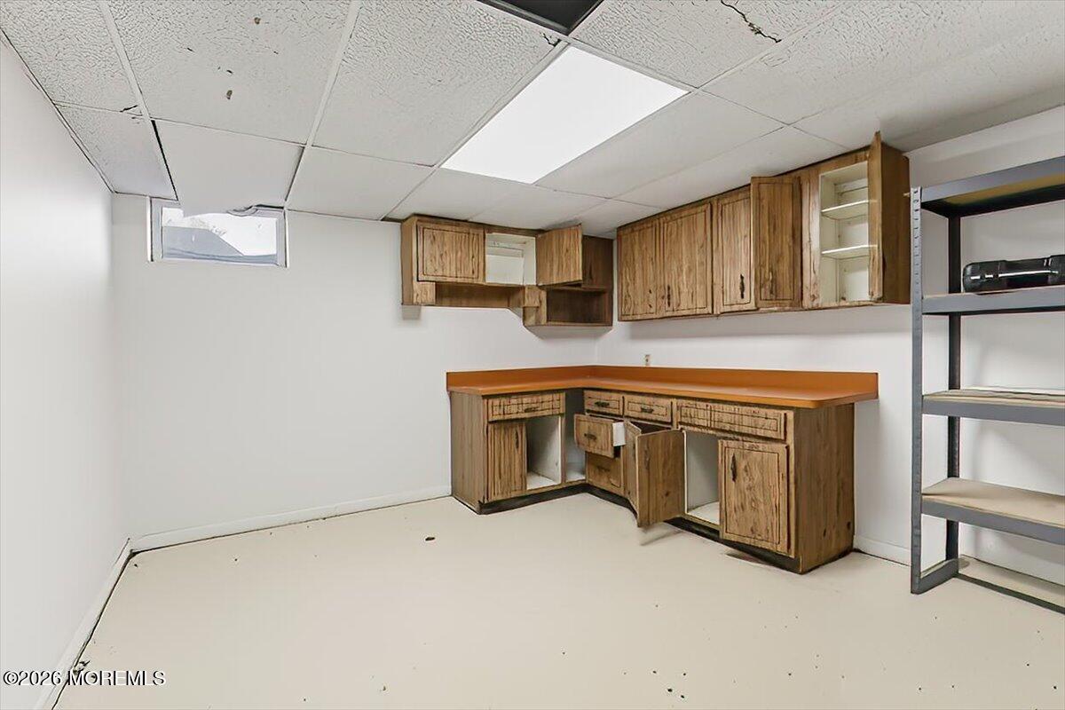 17 North Main Street Marlboro, NJ 07746 - Photo 63 of 67 a room with furniture and a fireplace