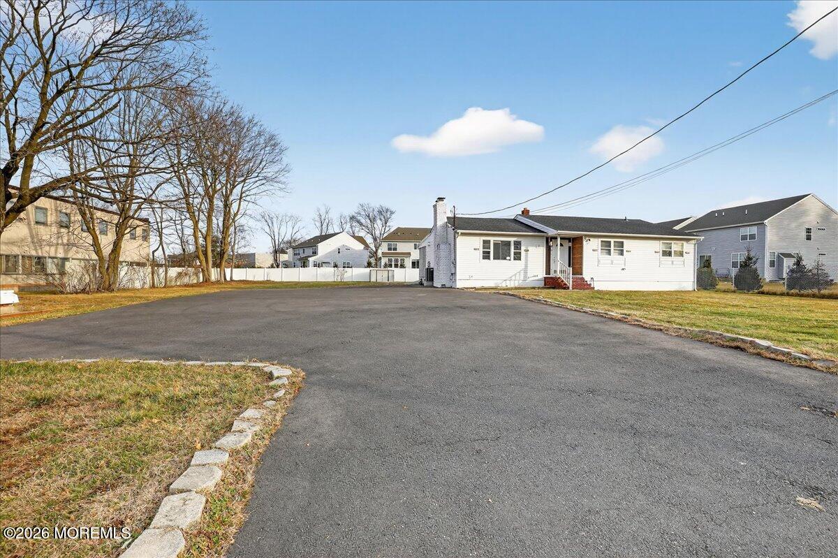 17 North Main Street Marlboro, NJ 07746 - Photo 7 of 67 a view of an house with backyard space