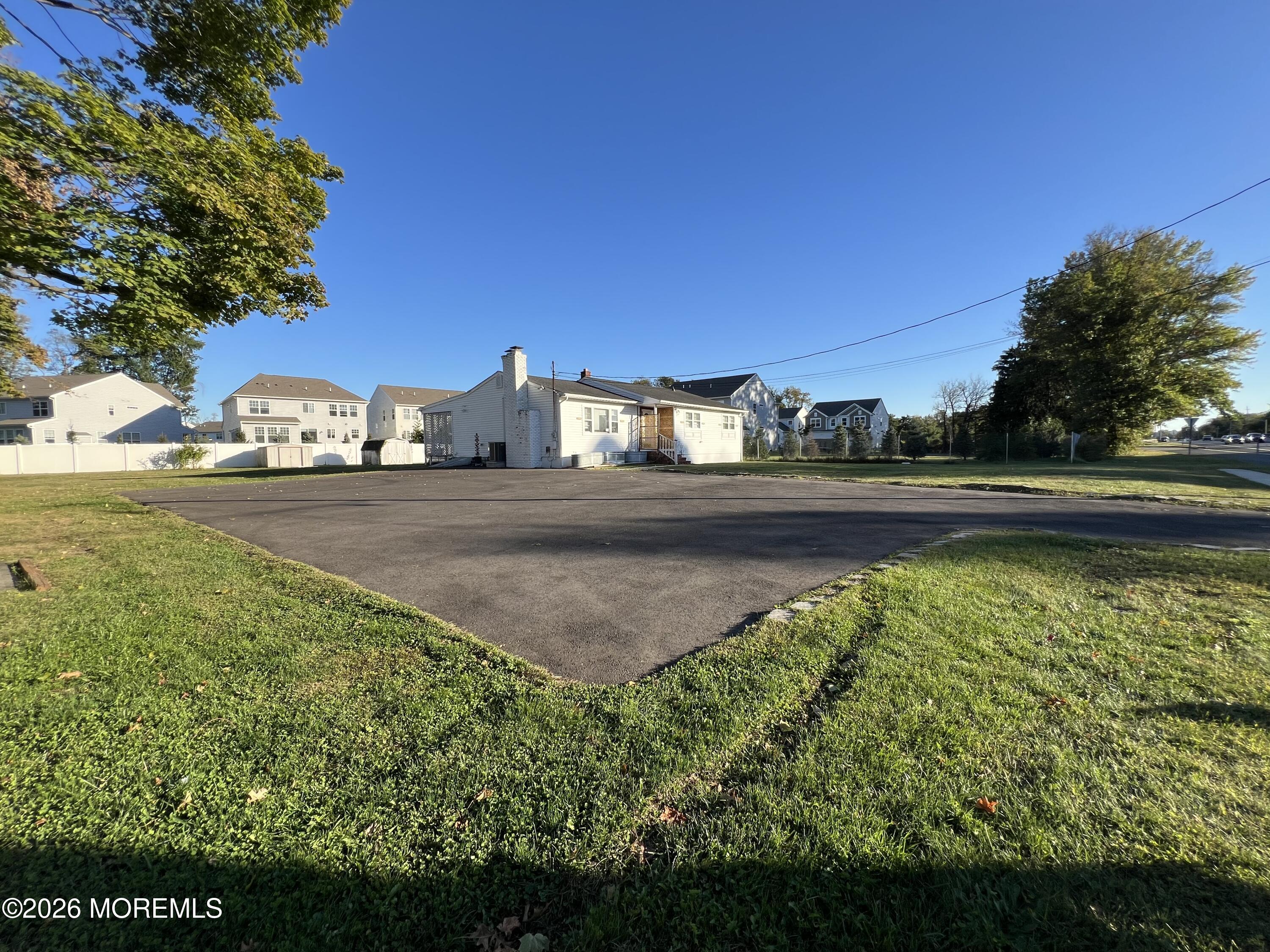 17 North Main Street Marlboro, NJ 07746 - Photo 9 of 67 a view of swimming pool outdoor outdoor and green space