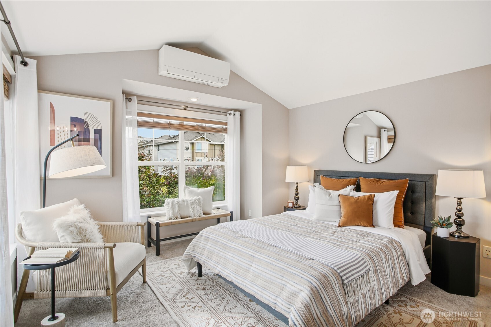 2635 Northwest 57th Street, Unit B Seattle, WA 98107 - Photo 12 of 28 a bedroom with a bed and a large window