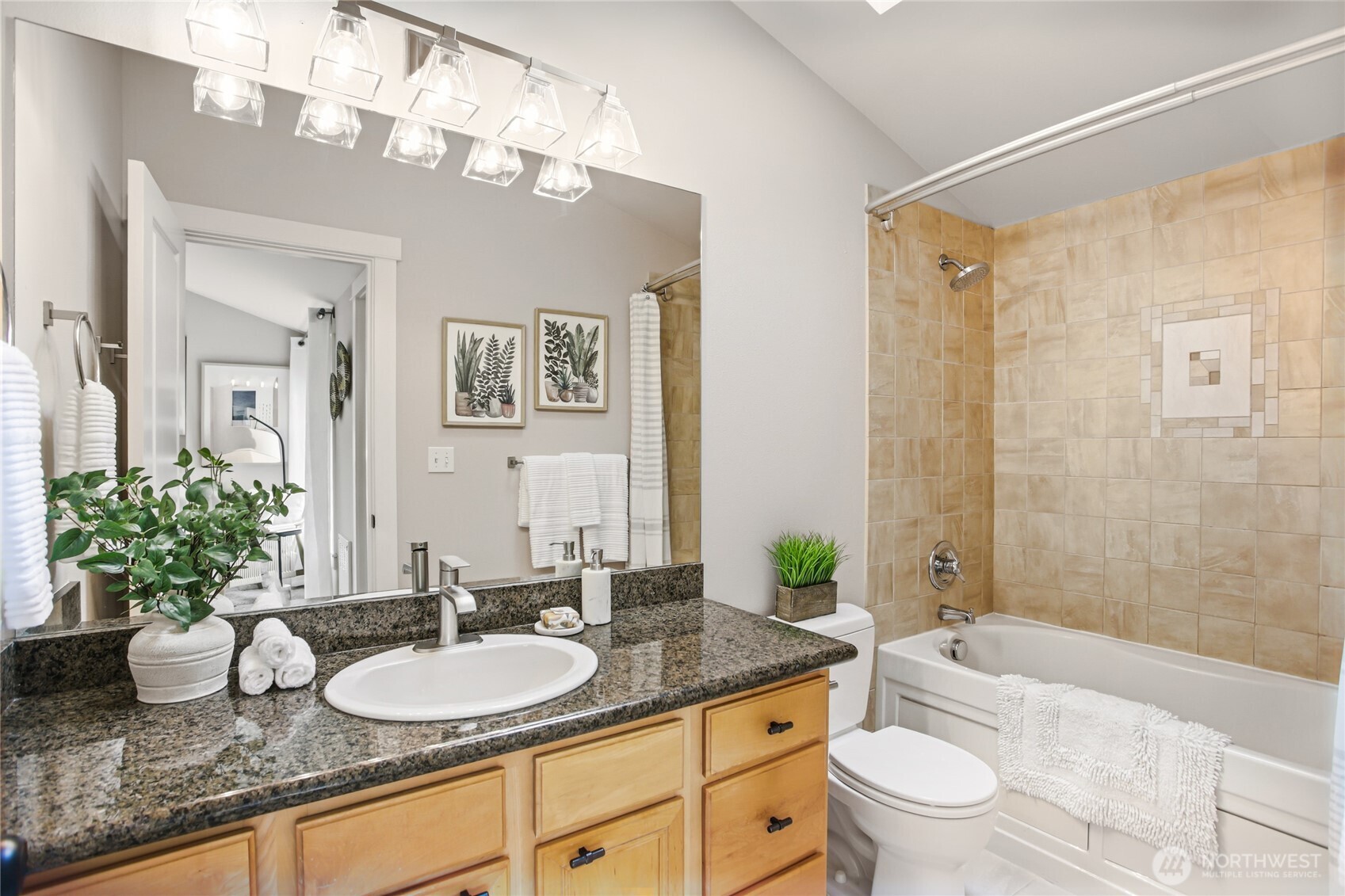 2635 Northwest 57th Street, Unit B Seattle, WA 98107 - Photo 14 of 28 a bathroom with a granite countertop double vanity sink mirror and toilet