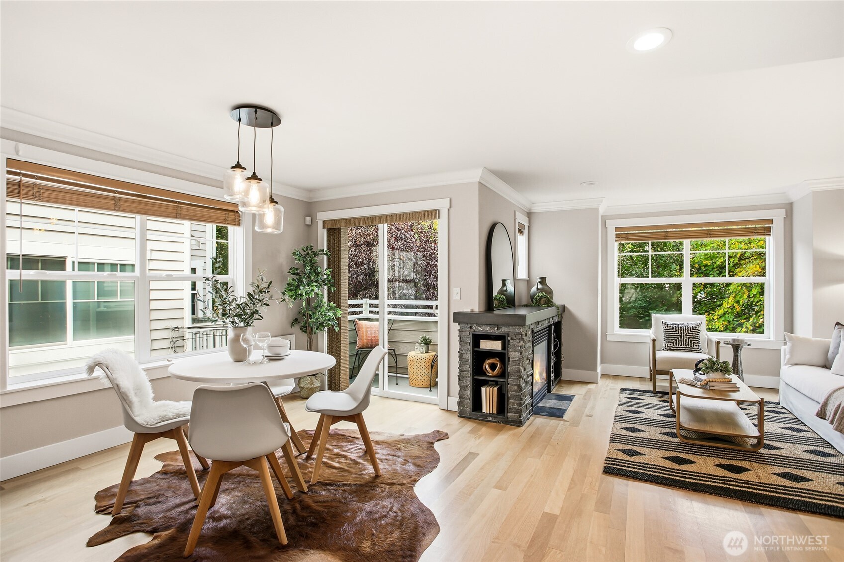 2635 Northwest 57th Street, Unit B Seattle, WA 98107 - Photo 3 of 28 a view of a dining room with furniture window and outside view