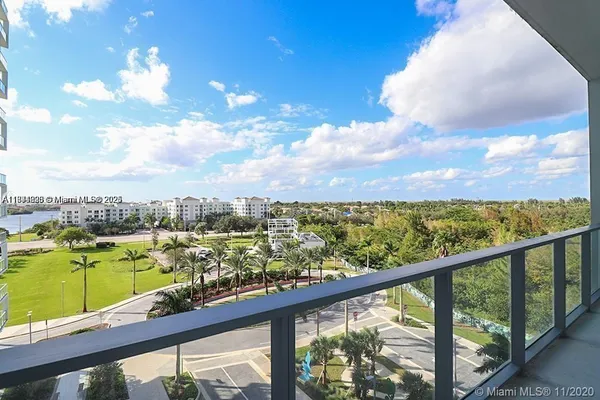 a view of a city skyline from a balcony