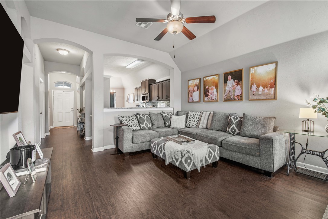 3014 Positano Loop Bryan, TX 77808 - Photo 10 of 23 a living room with furniture and a flat screen tv