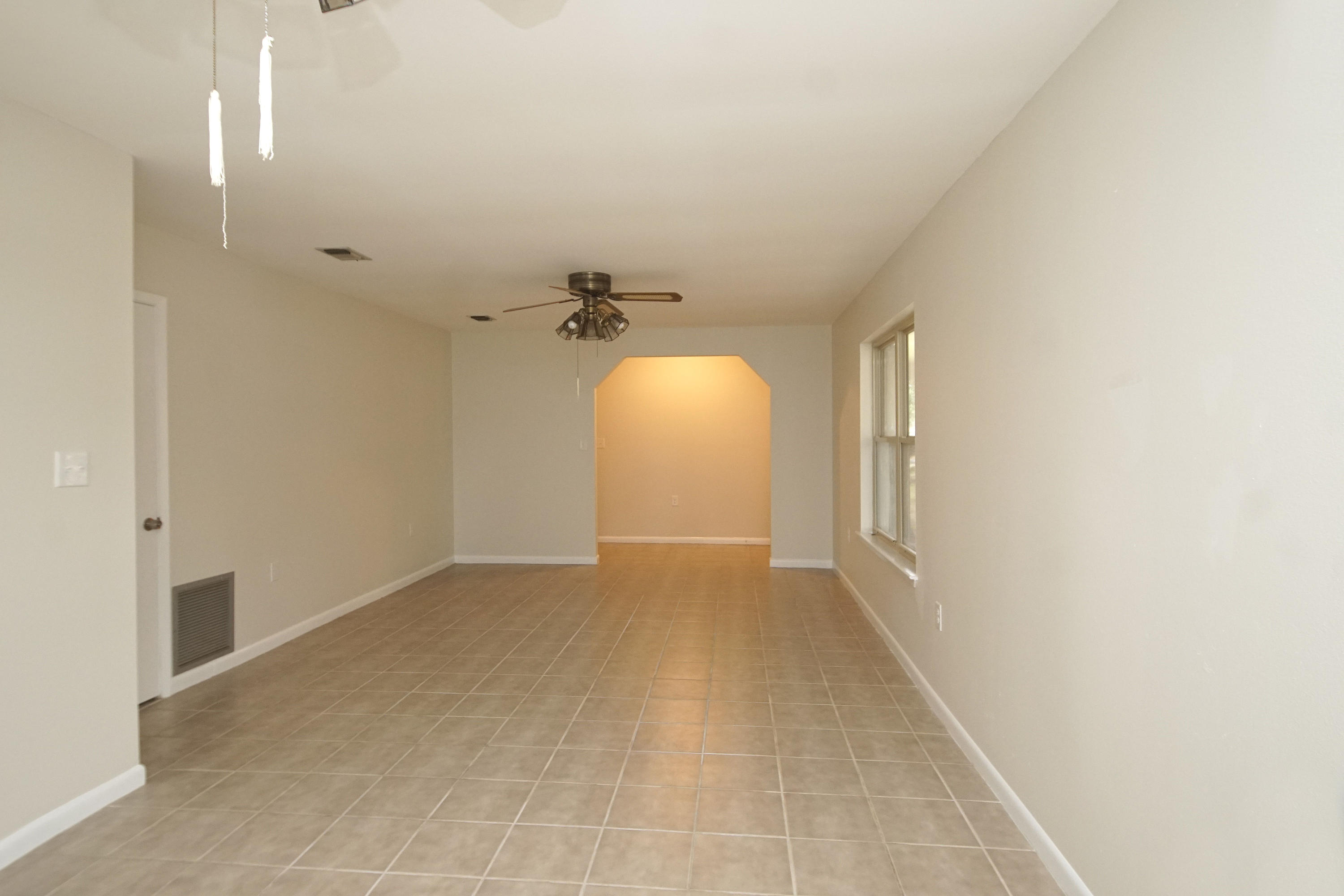 115 Country Club Road Shalimar, FL 32579 - Photo 7 of 25 a view of a room with a staircase