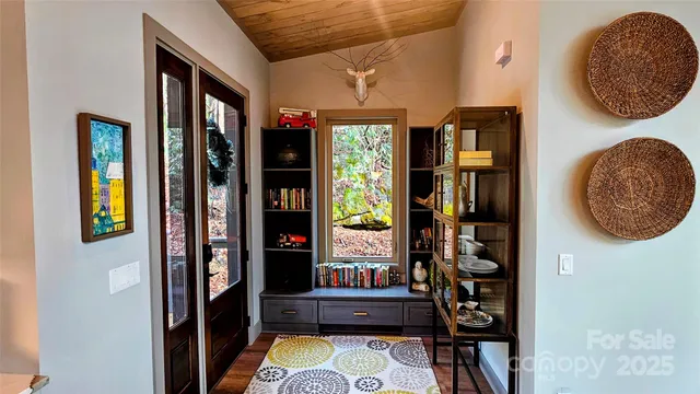 image of a room that has a bed and a mirror