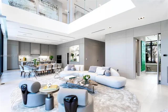 a view of house with swimming pool and sitting area