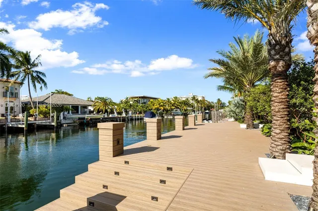 a view of swimming pool with outdoor seating