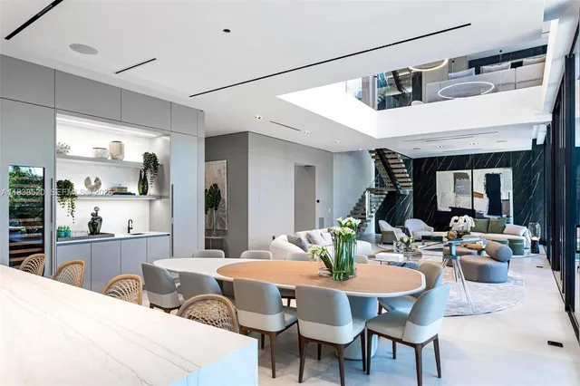 a kitchen view with a sink stainless steel appliances and cabinets