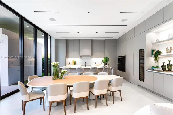 a kitchen view with a sink stainless steel appliances and cabinets
