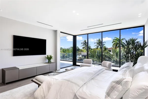 a view of a terrace with couches and sky view