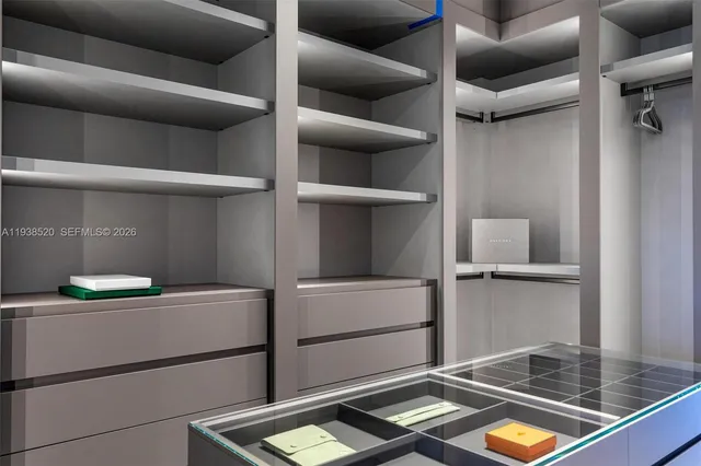 a view of a chairs and table in a patio