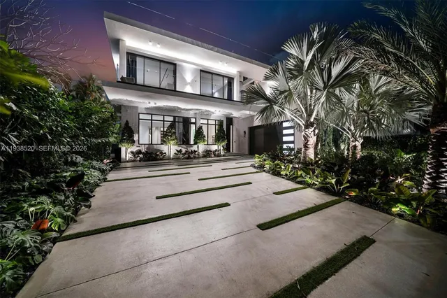 a view of a swimming pool with chairs in patio