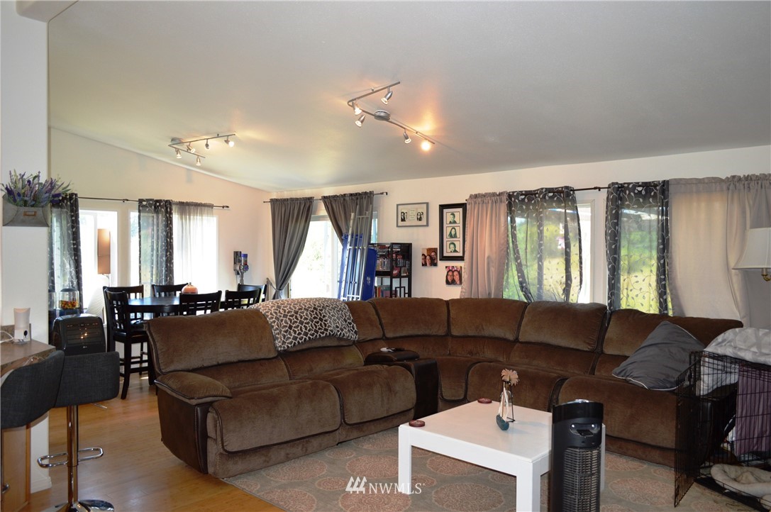 7855 Ham Road Custer, WA 98240 - Photo 14 of 39 a living room with furniture and a large window