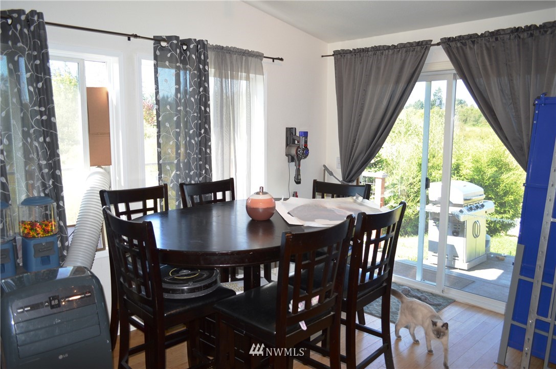 7855 Ham Road Custer, WA 98240 - Photo 15 of 39 a view of a dining room with furniture and window