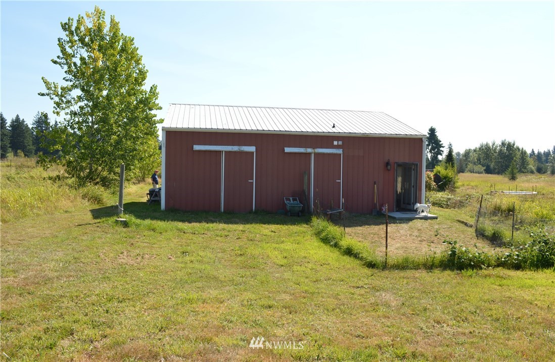 7855 Ham Road Custer, WA 98240 - Photo 33 of 39 a house with a yard
