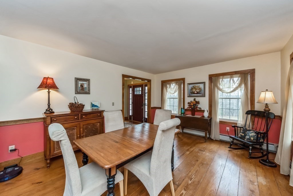 50 Old Poor Farm Road Ware, MA 01082 - Photo 9 of 33 a view of a dining room with furniture window and wooden floor