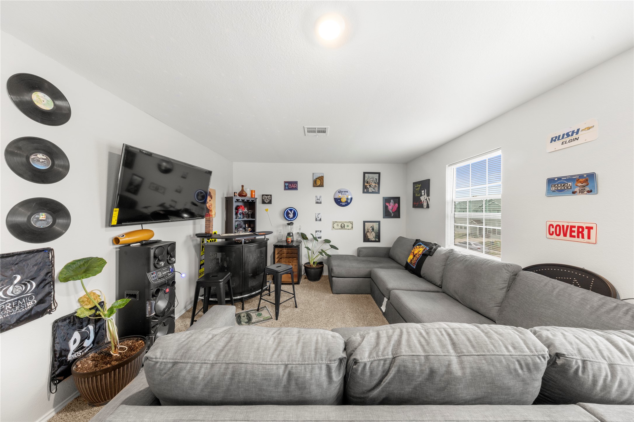 17701 Oso Cove Elgin, TX 78621 - Photo 7 of 9 View of carpeted living area