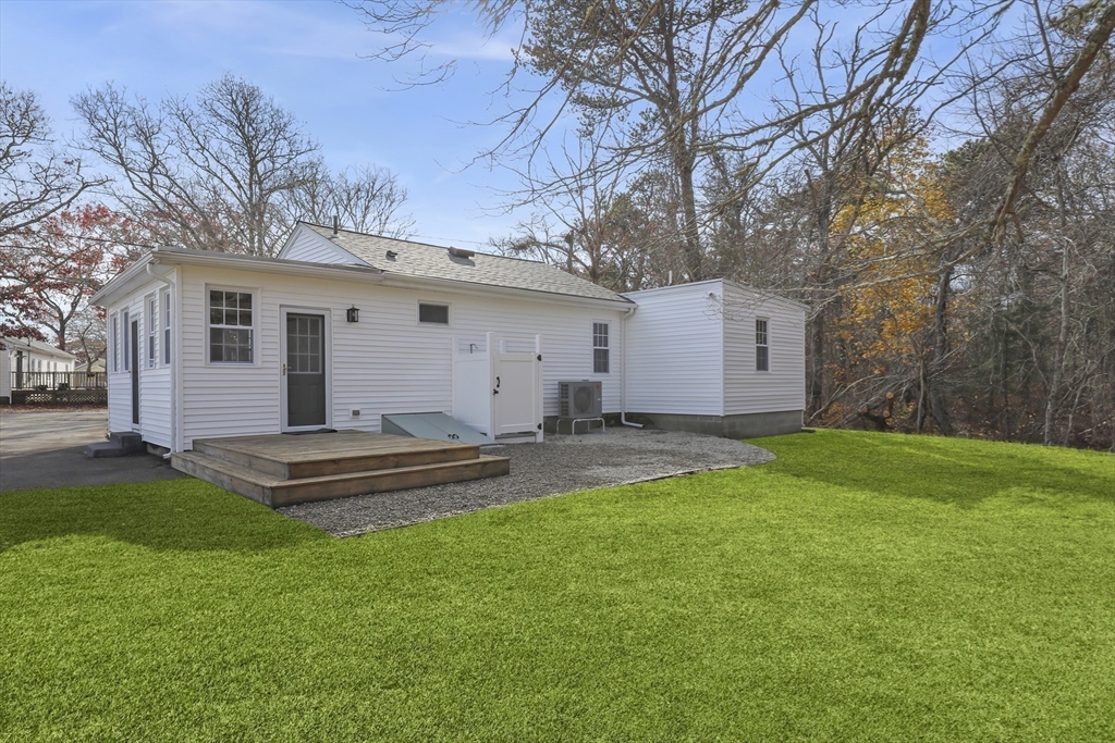 21 Weston Avenue Wareham, MA 02571 - Photo 18 of 23 a front view of house with yard and outdoor seating