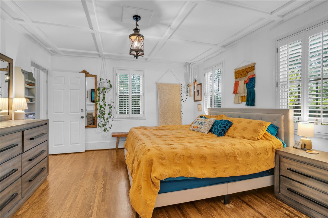 1107 Springdale Road Anderson, SC 29621 - Photo 18 of 49 This inviting bedroom features rich hardwood flooring and distinctive tray ceilings.