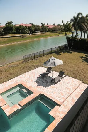 a view of a workspace with furniture